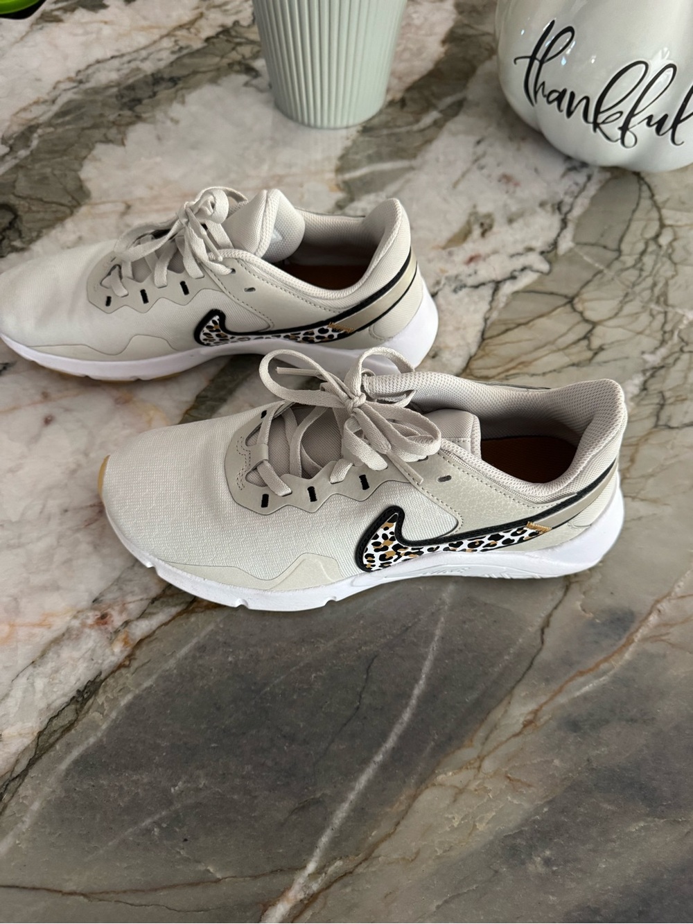 Nike Women’s Light Beige Sneakers with Leopard Swoosh